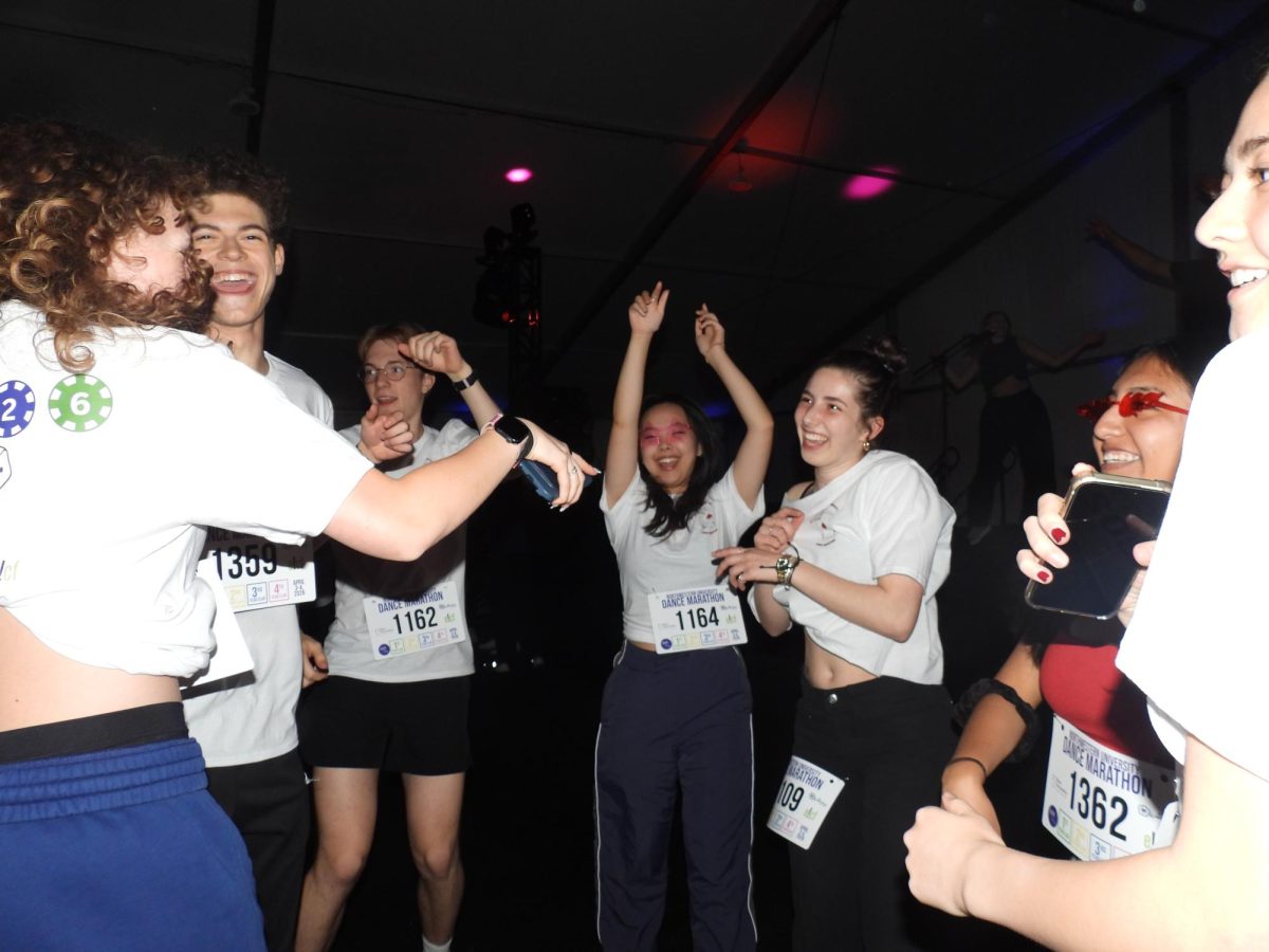 People dance together.