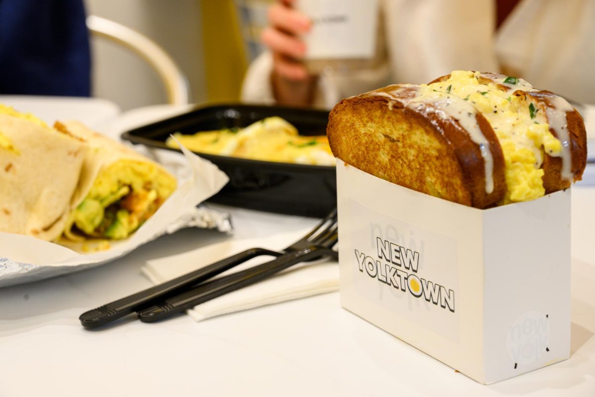 An egg sandwich in a white box.