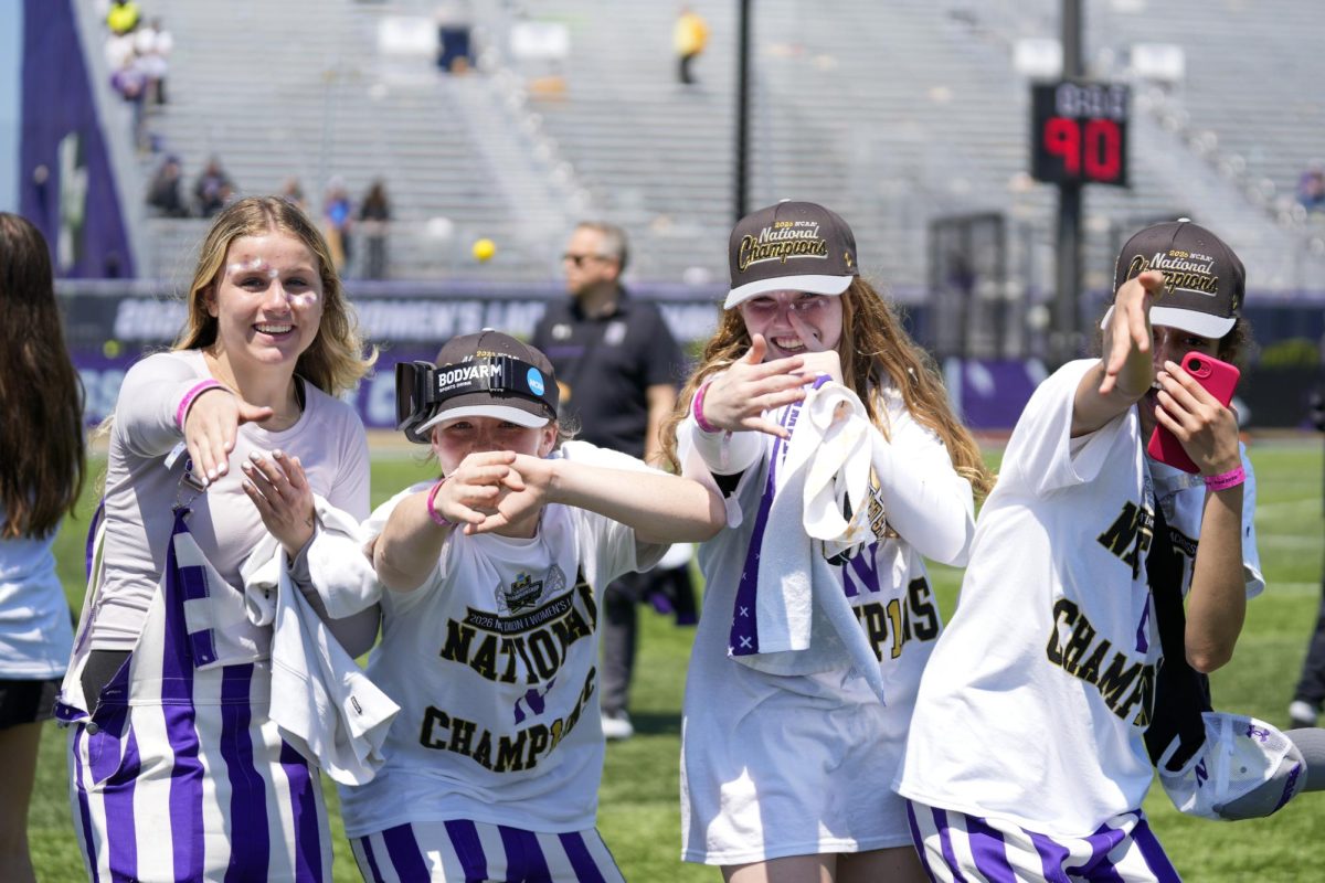 Players in white celebrate.