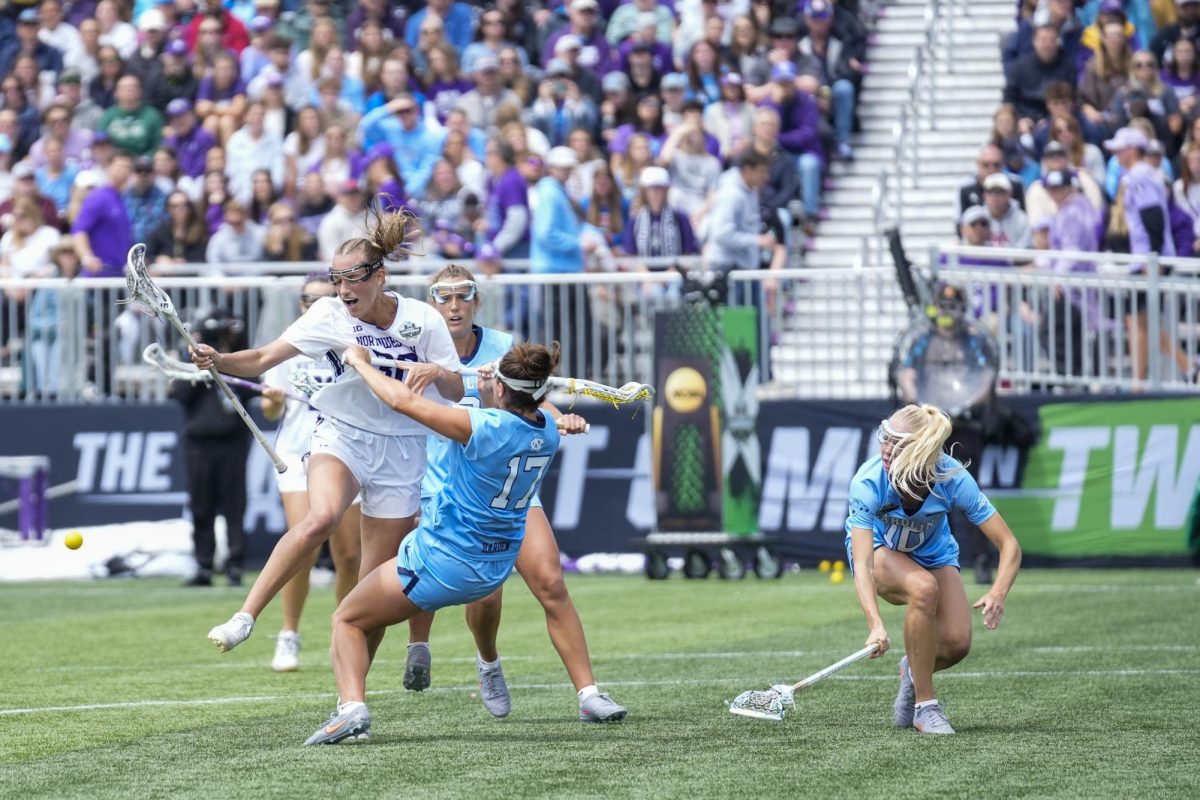 Players in blue surround a player in white.