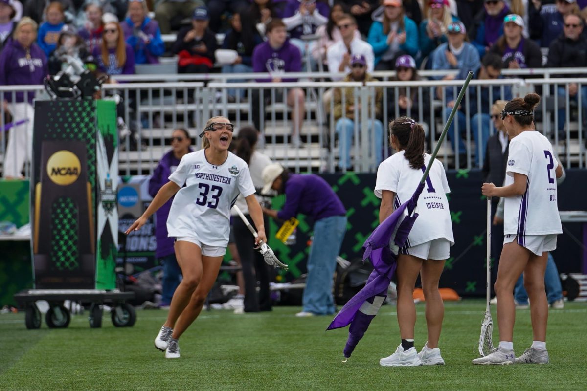 A player runs out to greet fellow players on the field.