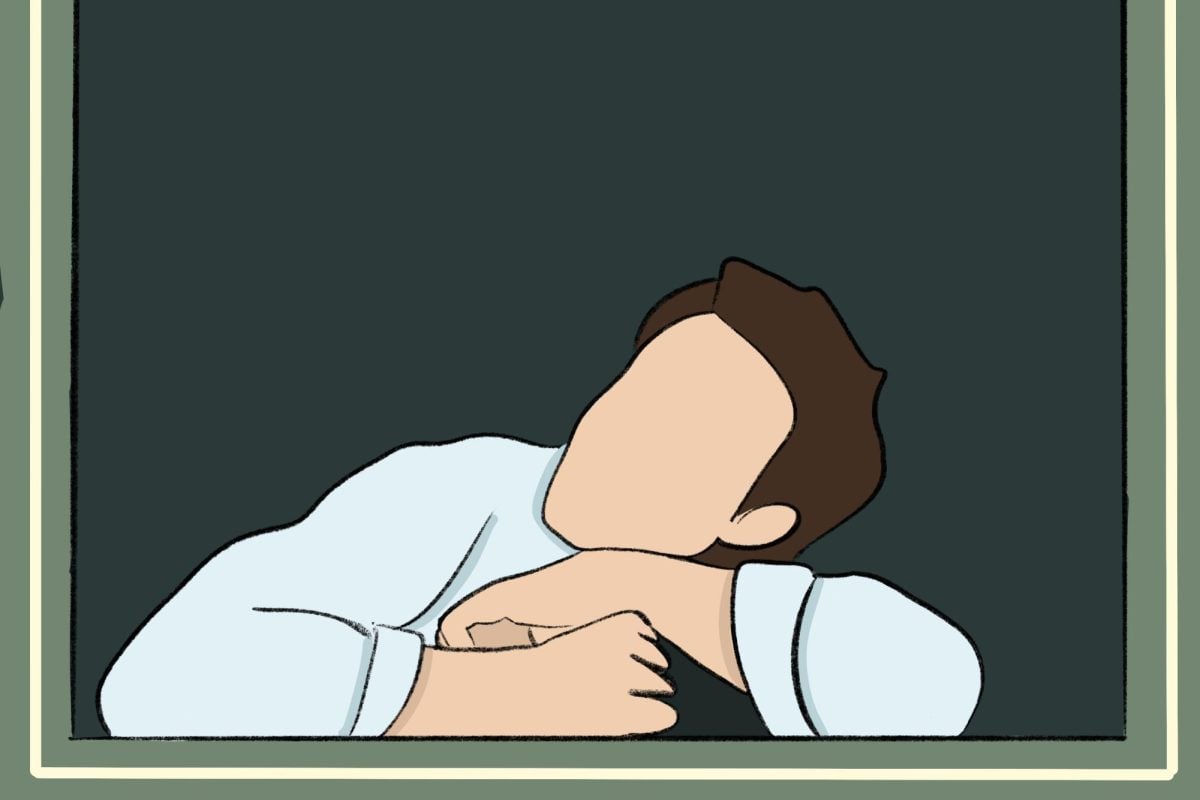 A person laying on a windowsill and looking into the distance.