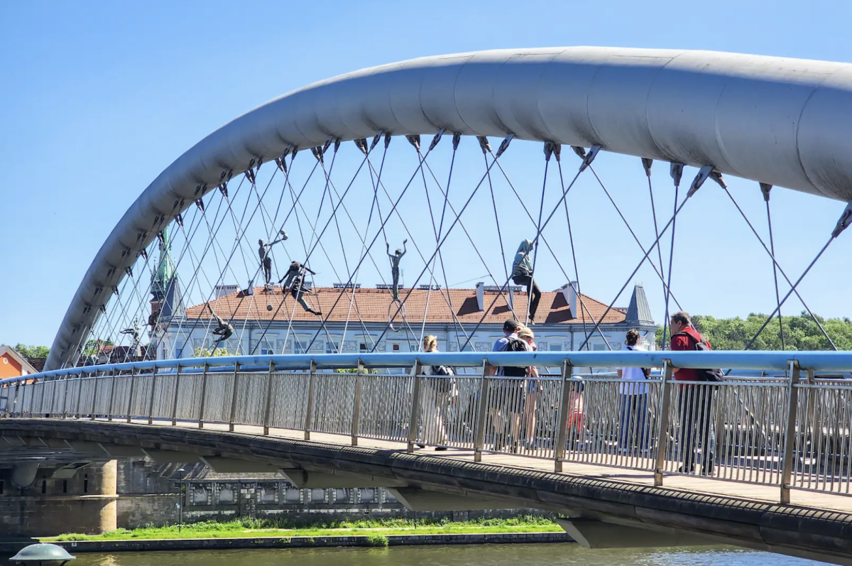 The Father Bernatek Footbridge, a pedestrian bridge known as Kraków’s “lovers’ bridge” that we passed as we made our way to Oskar Schindler’s Enamel Factory. 