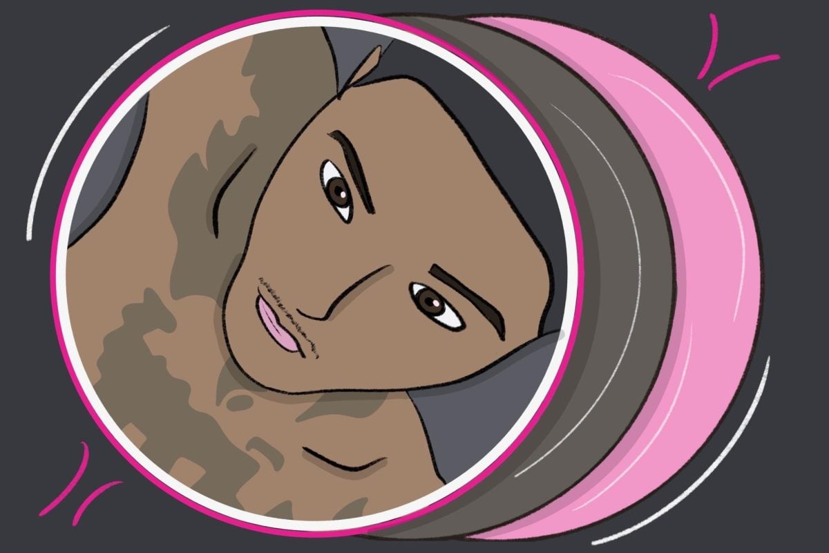 A person’s face in a pink circle